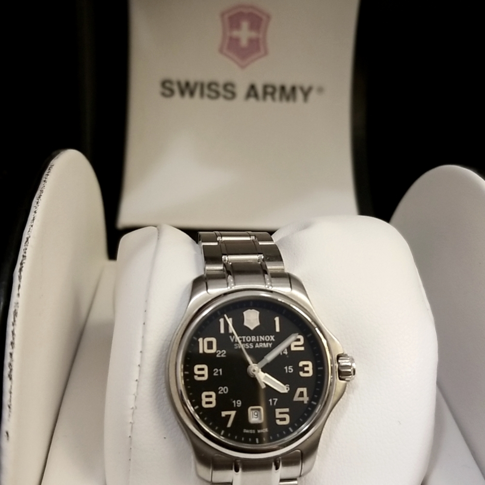 Swiss Army women watch.  New with original tag and box.  Stainless steel.